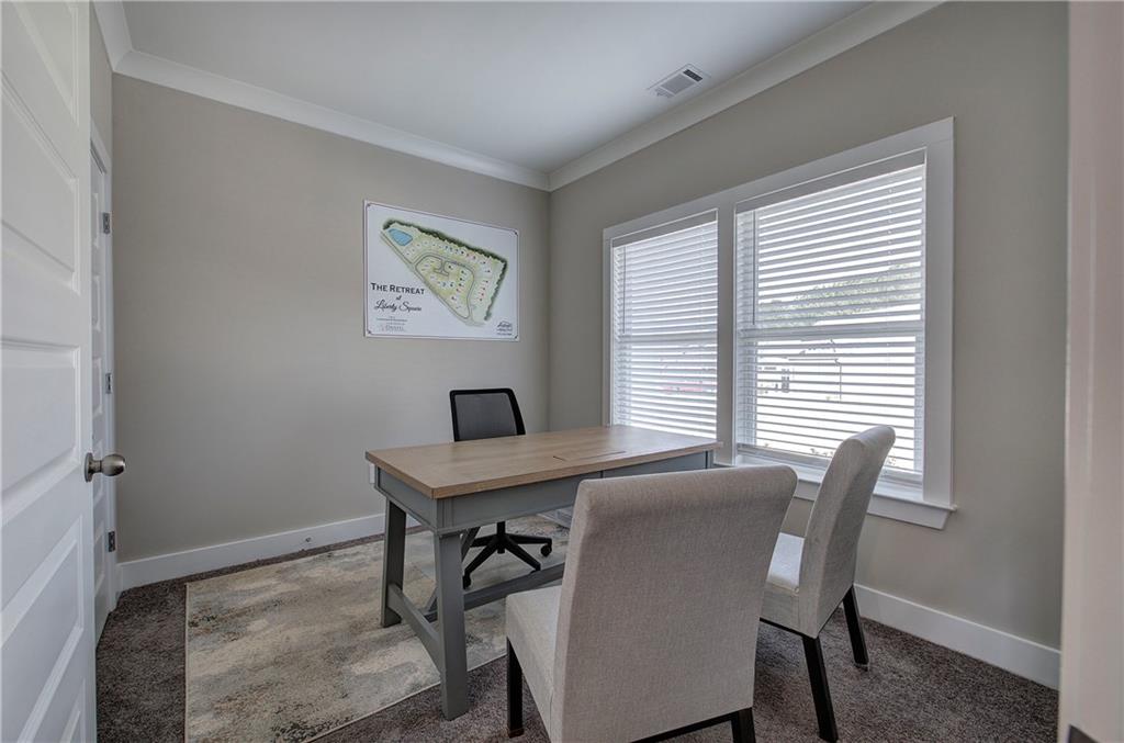 200 Daisy Court Cartersville, GA 30121 - Photo 49 of 73 a view of a dining room with a table and chairs