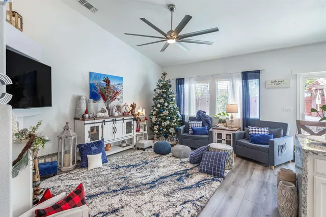 a living room with furniture or couch and a flat screen tv