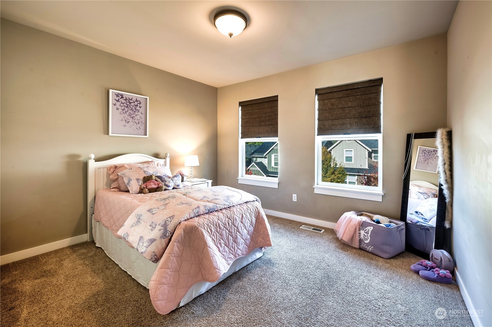 14372 3rd Circle Northeast Duvall, WA 98019 - Photo 14 of 34 a bedroom with a bed and a window