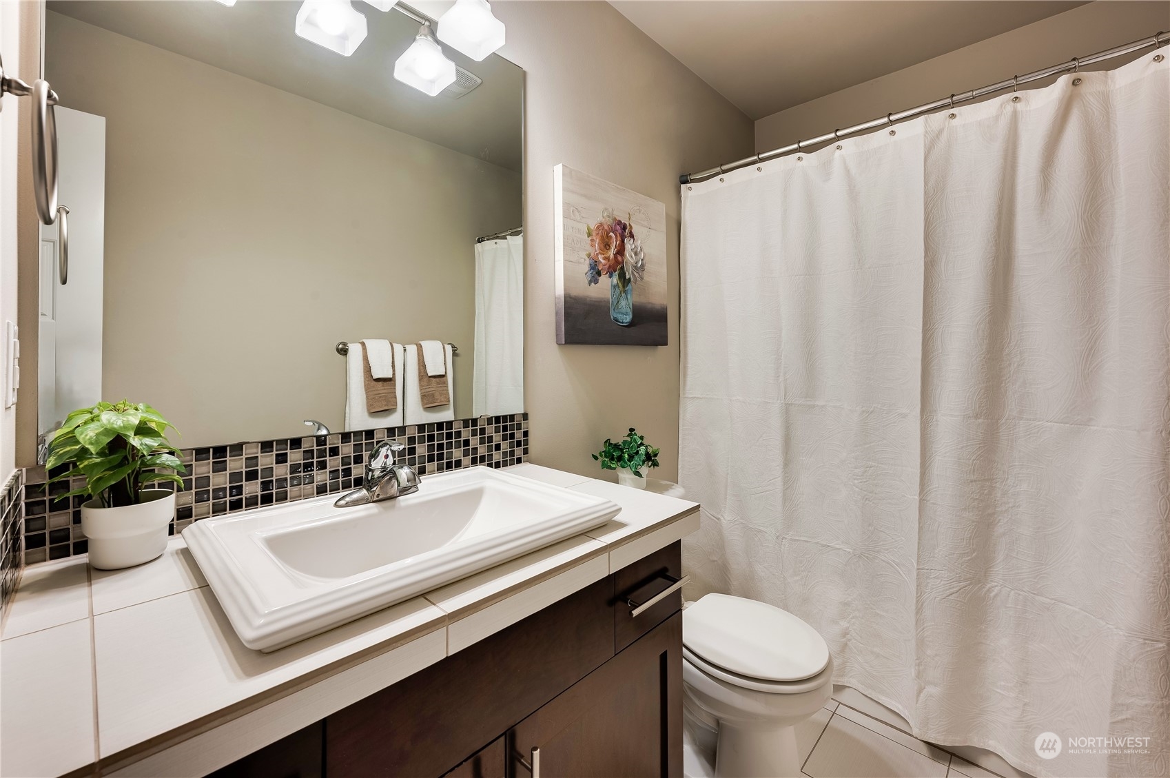 14372 3rd Circle Northeast Duvall, WA 98019 - Photo 17 of 34 a bathroom with a sink toilet and shower