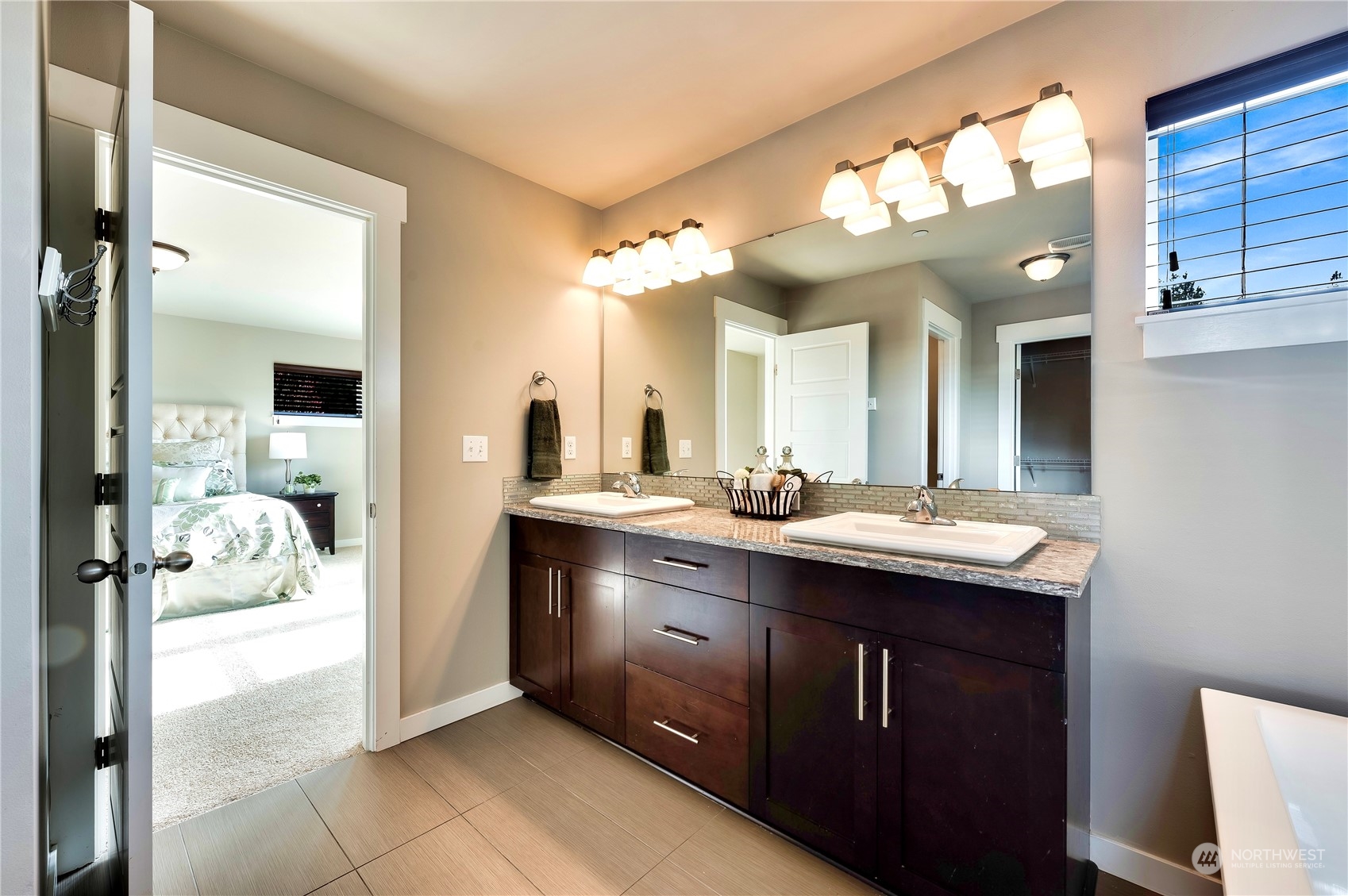 14372 3rd Circle Northeast Duvall, WA 98019 - Photo 19 of 34 a bathroom with a sink double vanity and a mirror