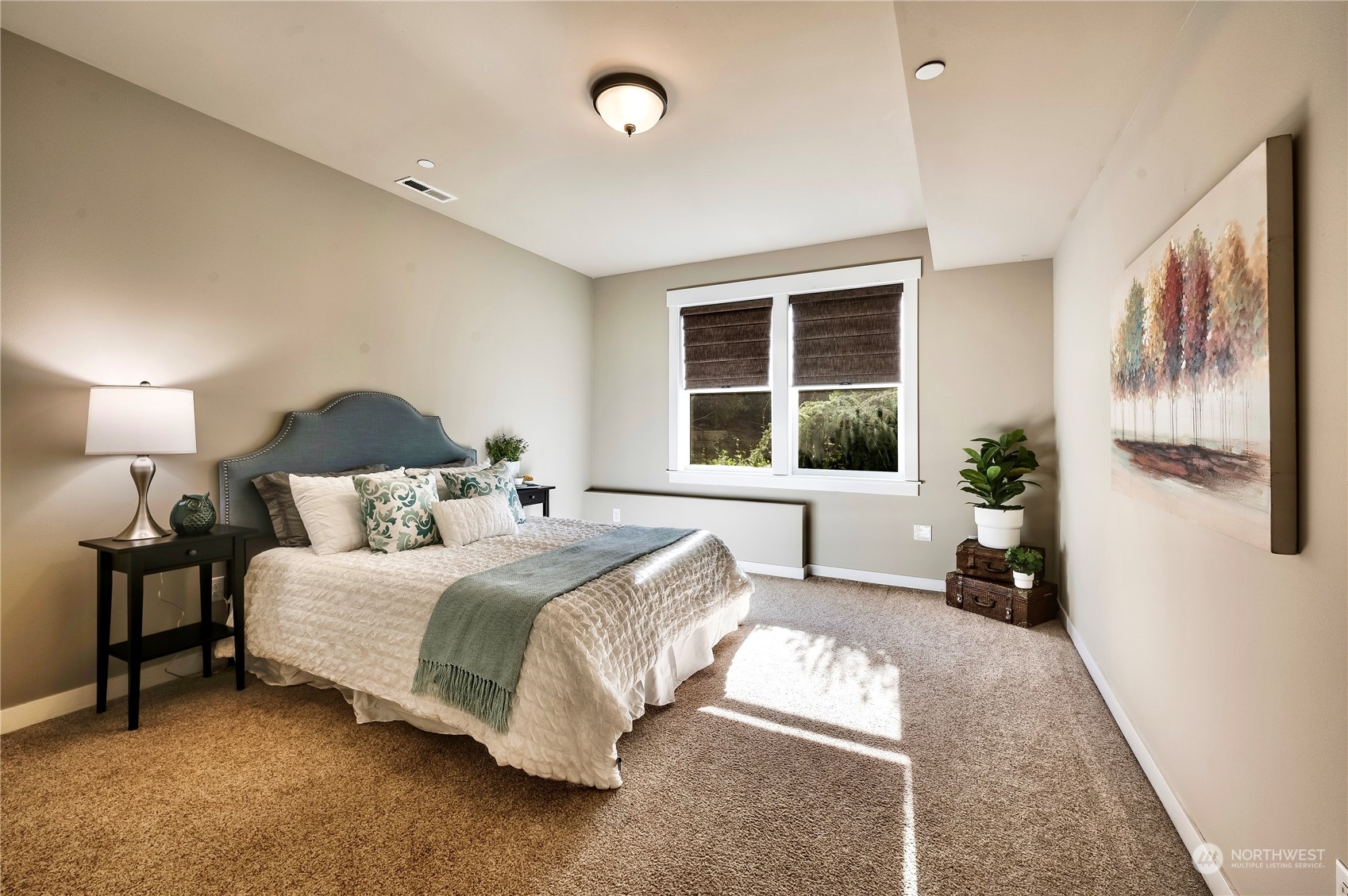 14372 3rd Circle Northeast Duvall, WA 98019 - Photo 24 of 34 a bedroom with a bed and wooden floor
