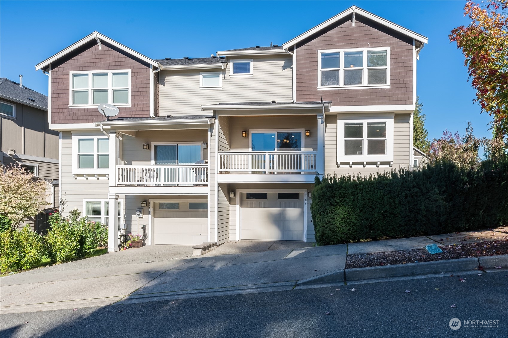 14372 3rd Circle Northeast Duvall, WA 98019 - Photo 26 of 34 a front view of a house with a yard