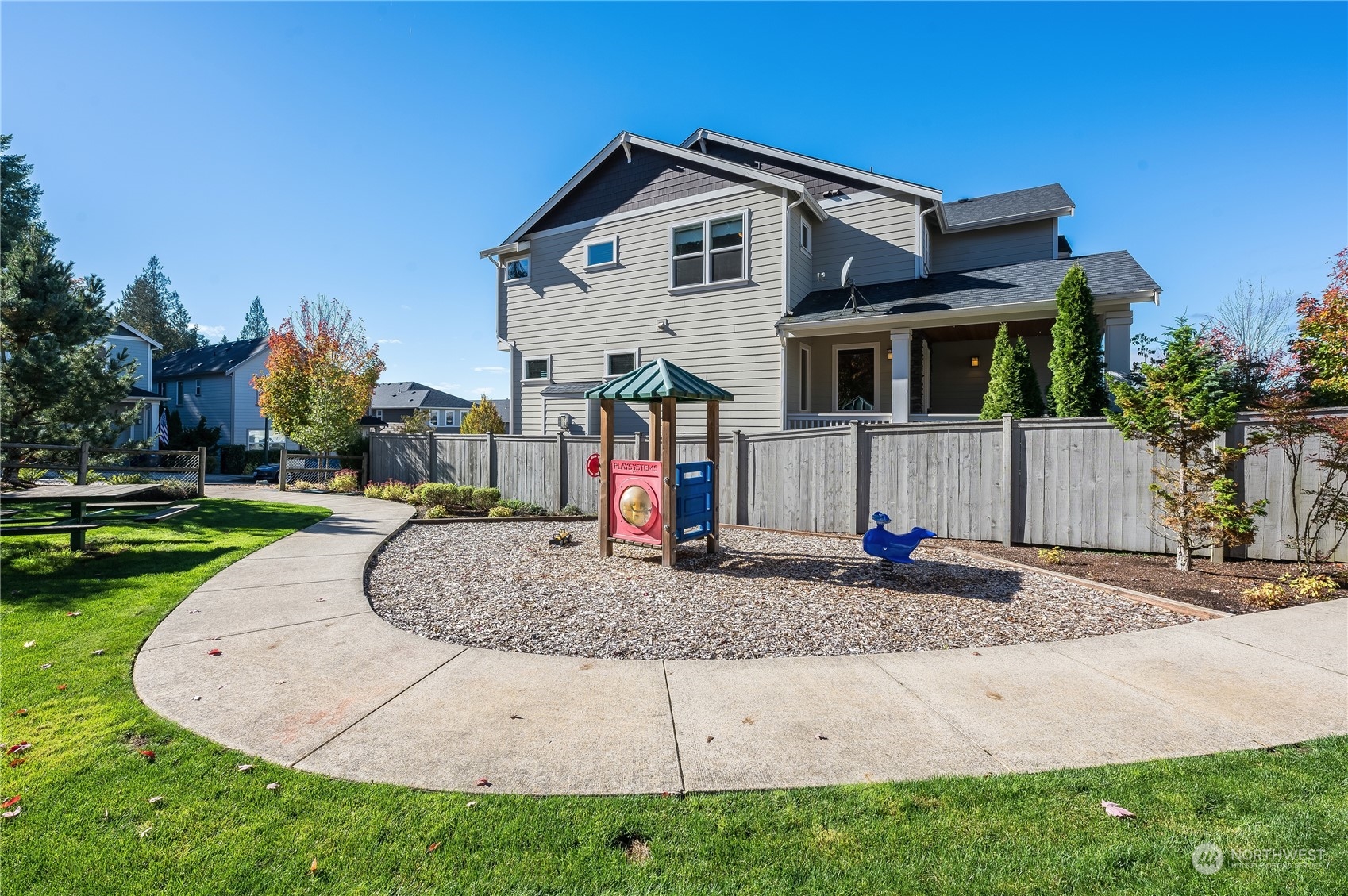 14372 3rd Circle Northeast Duvall, WA 98019 - Photo 27 of 34 a front view of a house with garage