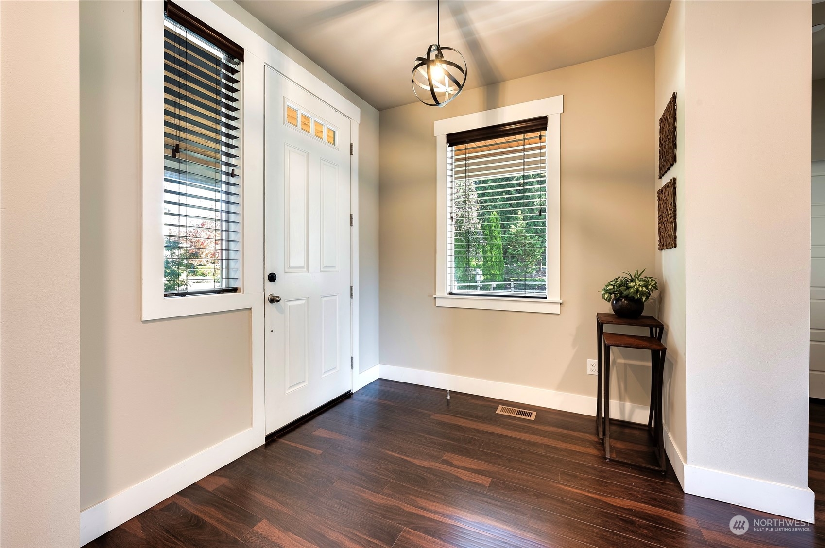14372 3rd Circle Northeast Duvall, WA 98019 - Photo 3 of 34 a view of empty room with wooden floor and fan