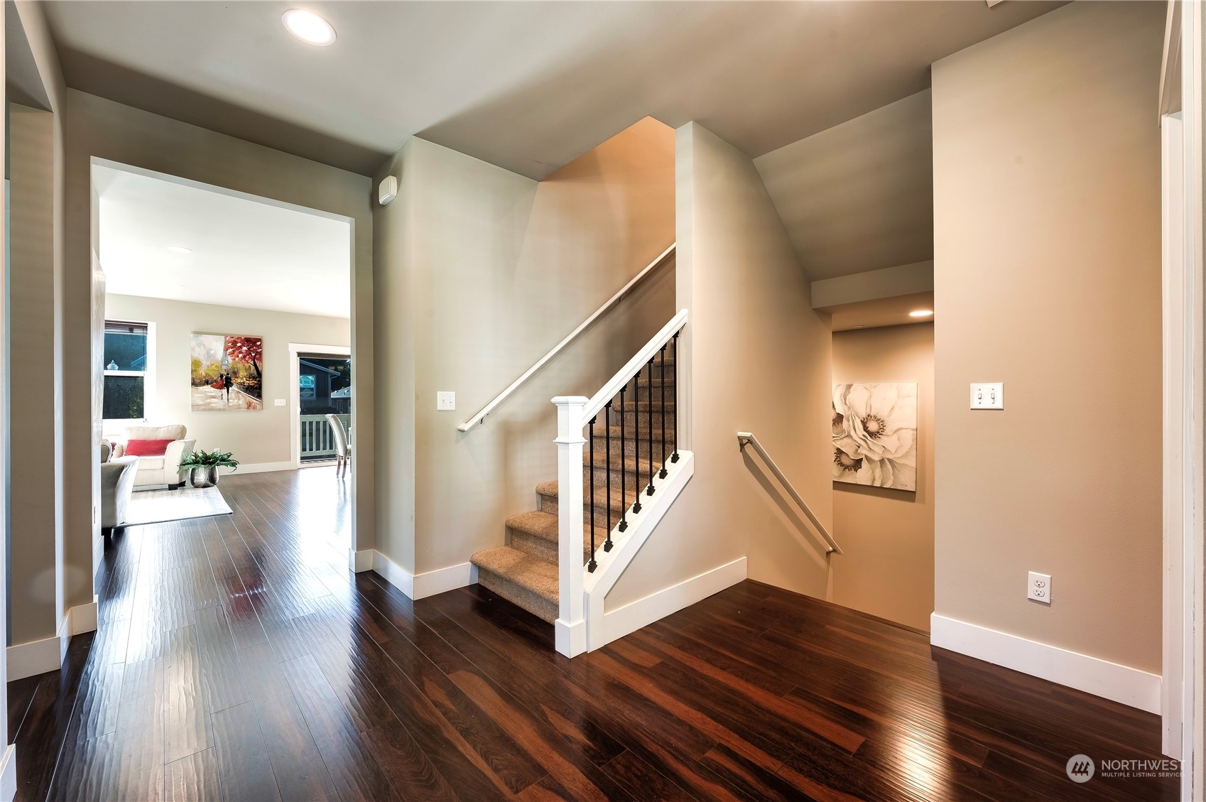 14372 3rd Circle Northeast Duvall, WA 98019 - Photo 4 of 34 a view of a hallway view with wooden floor and staircase