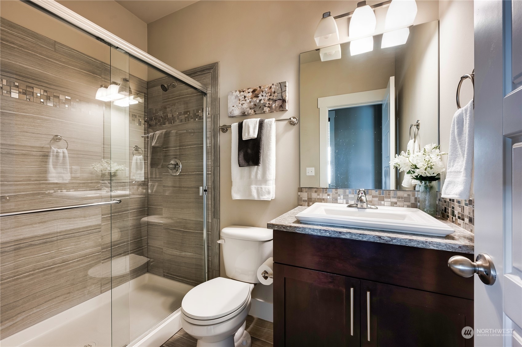 14372 3rd Circle Northeast Duvall, WA 98019 - Photo 6 of 34 a bathroom with a sink toilet and shower
