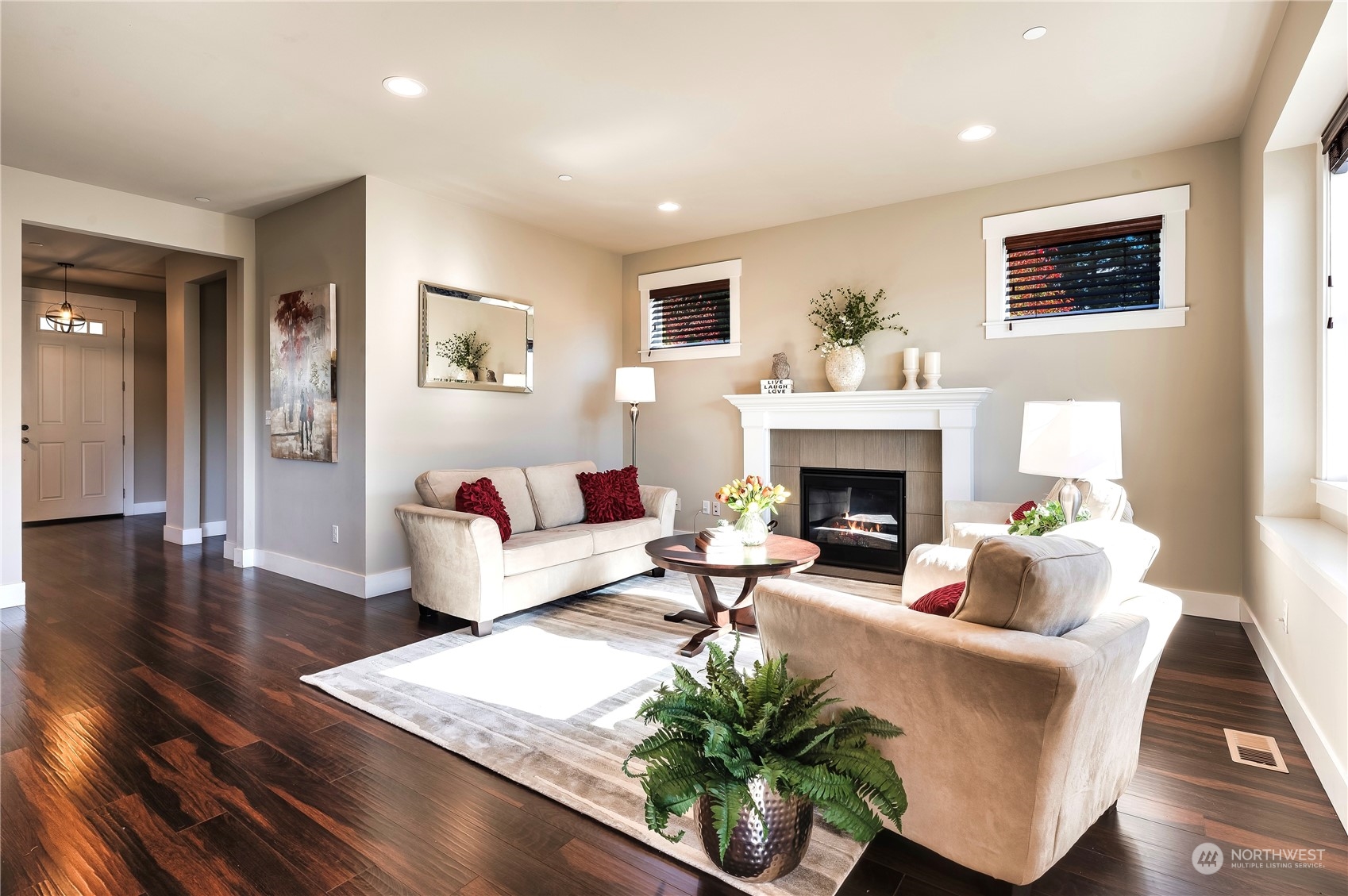 14372 3rd Circle Northeast Duvall, WA 98019 - Photo 7 of 34 a living room with furniture and a fireplace