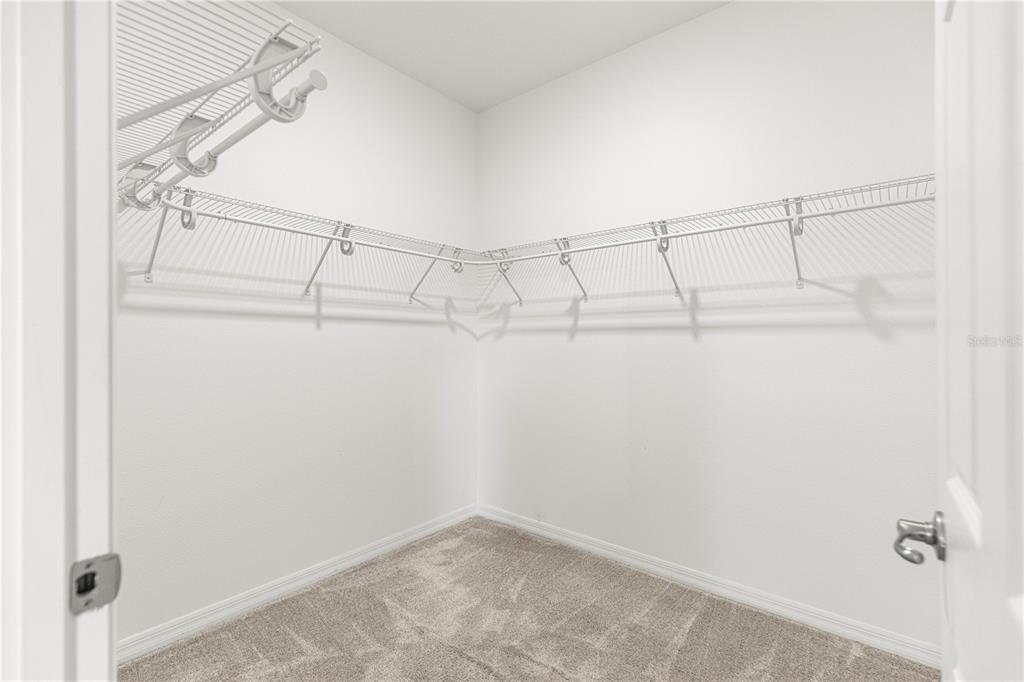 8546 Southwest 79th Avenue Ocala, FL 34476 - Photo 29 of 42 a view of a room with racks on the wall