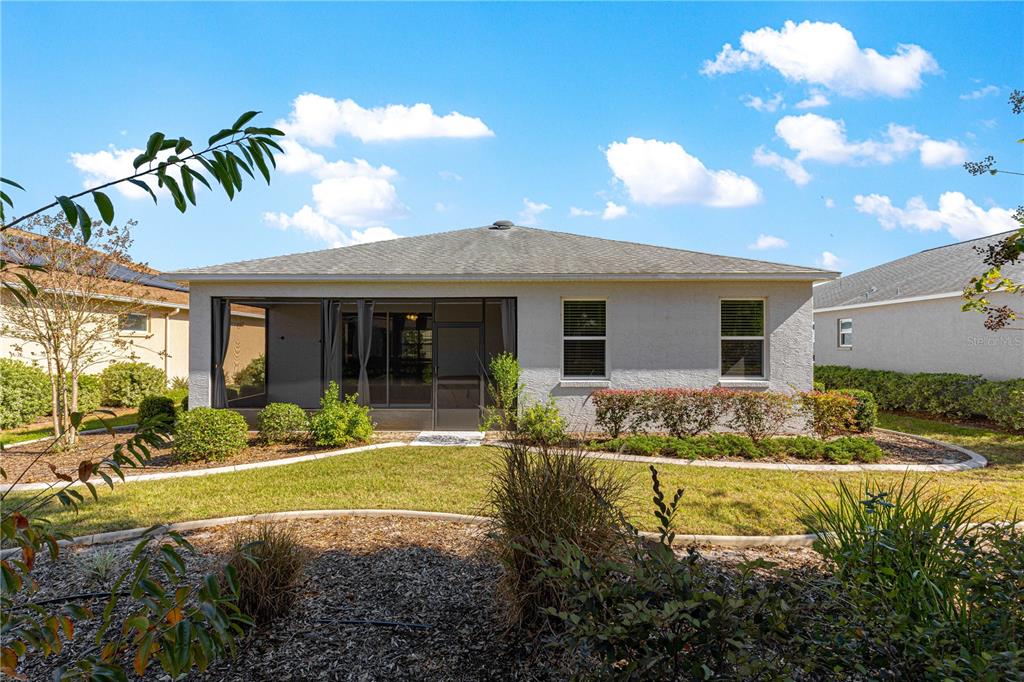 8546 Southwest 79th Avenue Ocala, FL 34476 - Photo 39 of 42 a front view of a house with garden