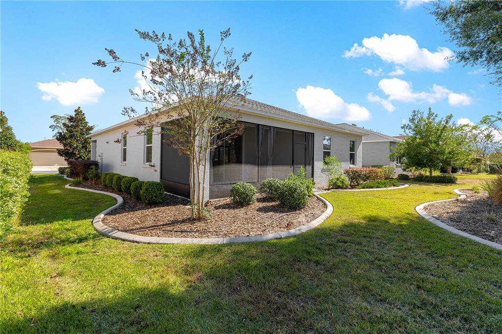 8546 Southwest 79th Avenue Ocala, FL 34476 - Photo 41 of 42 a view of a house with swimming pool and yard