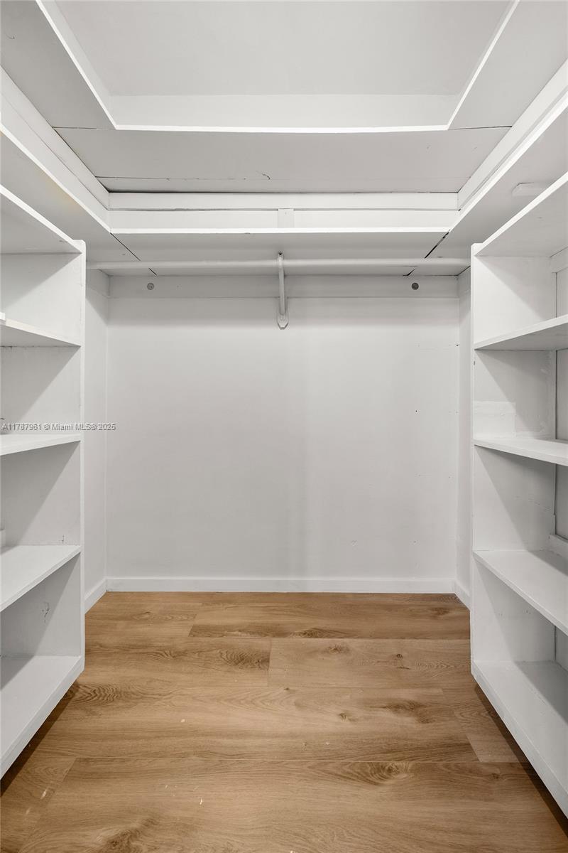2411 Biscayne Boulevard, Unit 2 Miami, FL 33137 - Photo 21 of 25 a view of an empty walk in closet