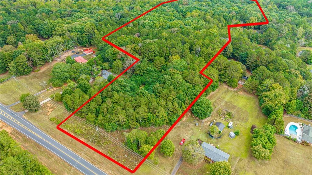 0 Ga-81 Covington, GA 30014 - Photo 15 of 17 a close up of a lush green field with large trees