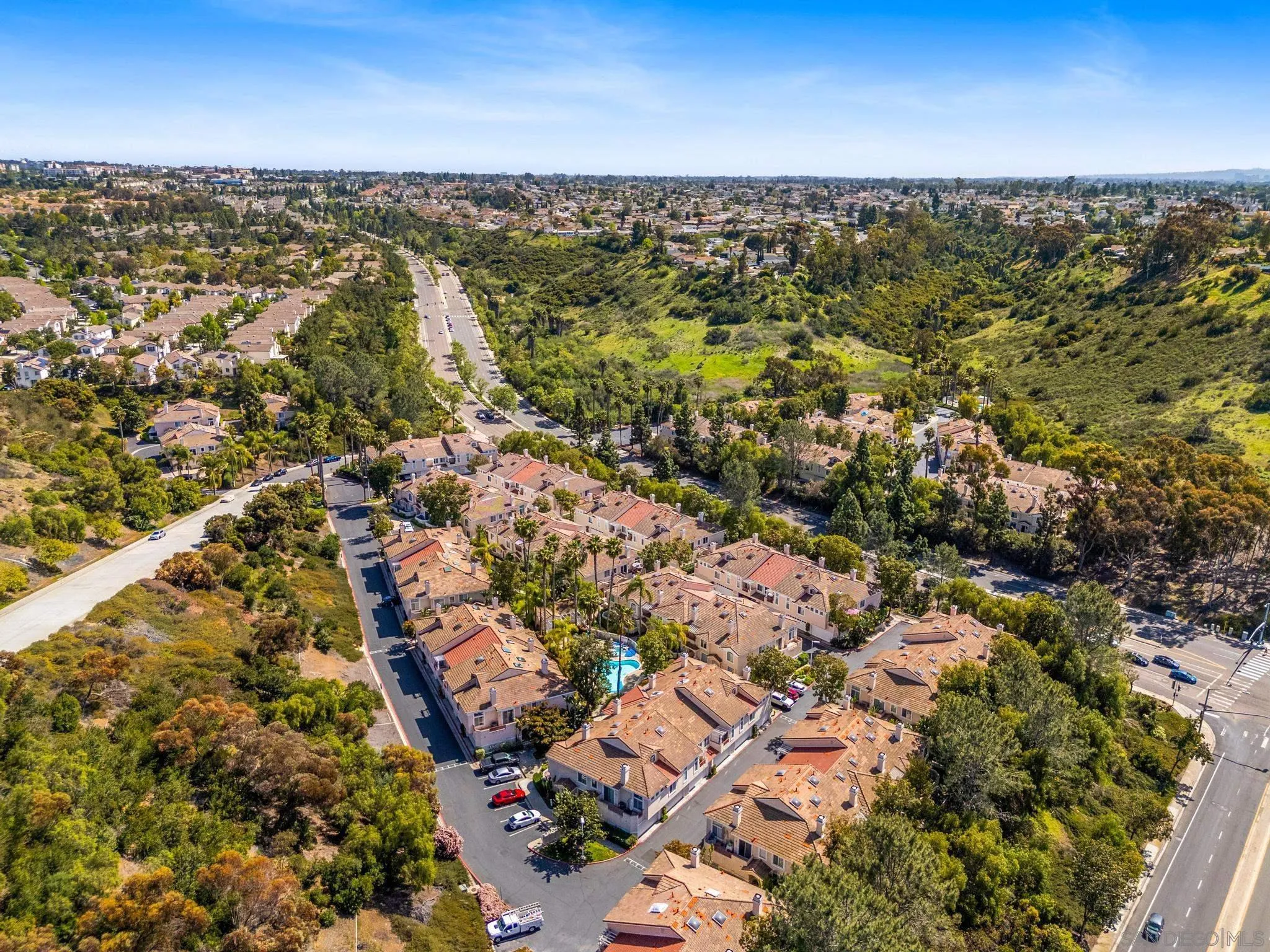9338 Babauta Road, Unit 78 San Diego, CA 92129 - Photo 25 of 26 an aerial view of residential building with parking space