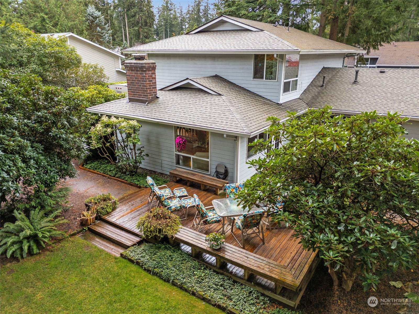 14130 148th Place Southeast Renton, WA 98059 - Photo 1 of 39 an aerial view of a house with swimming pool and a yard
