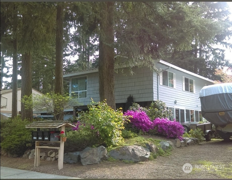 14130 148th Place Southeast Renton, WA 98059 - Photo 3 of 39 a front view of a house with sitting area