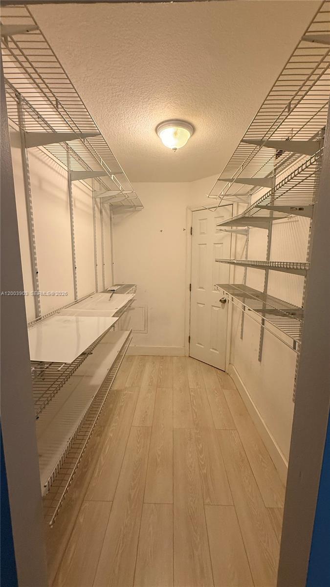 821 Lyons Road, Unit 21102 Coconut Creek, FL 33063 - Photo 6 of 17 a view of a garage