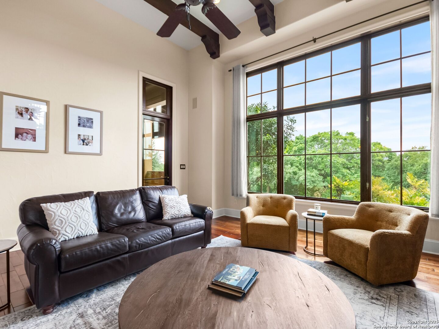 103 Castle Rock Boerne, TX 78006 - Photo 27 of 99 a living room with furniture and a large window