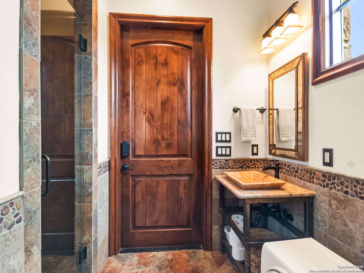 103 Castle Rock Boerne, TX 78006 - Photo 68 of 99 a bathroom with a sink a toilet and shower