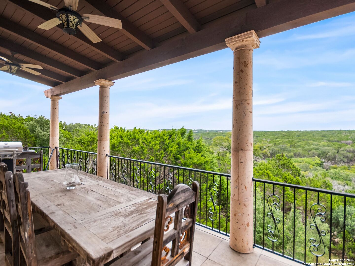 103 Castle Rock Boerne, TX 78006 - Photo 77 of 99 a view of a patio with a table chairs and a table