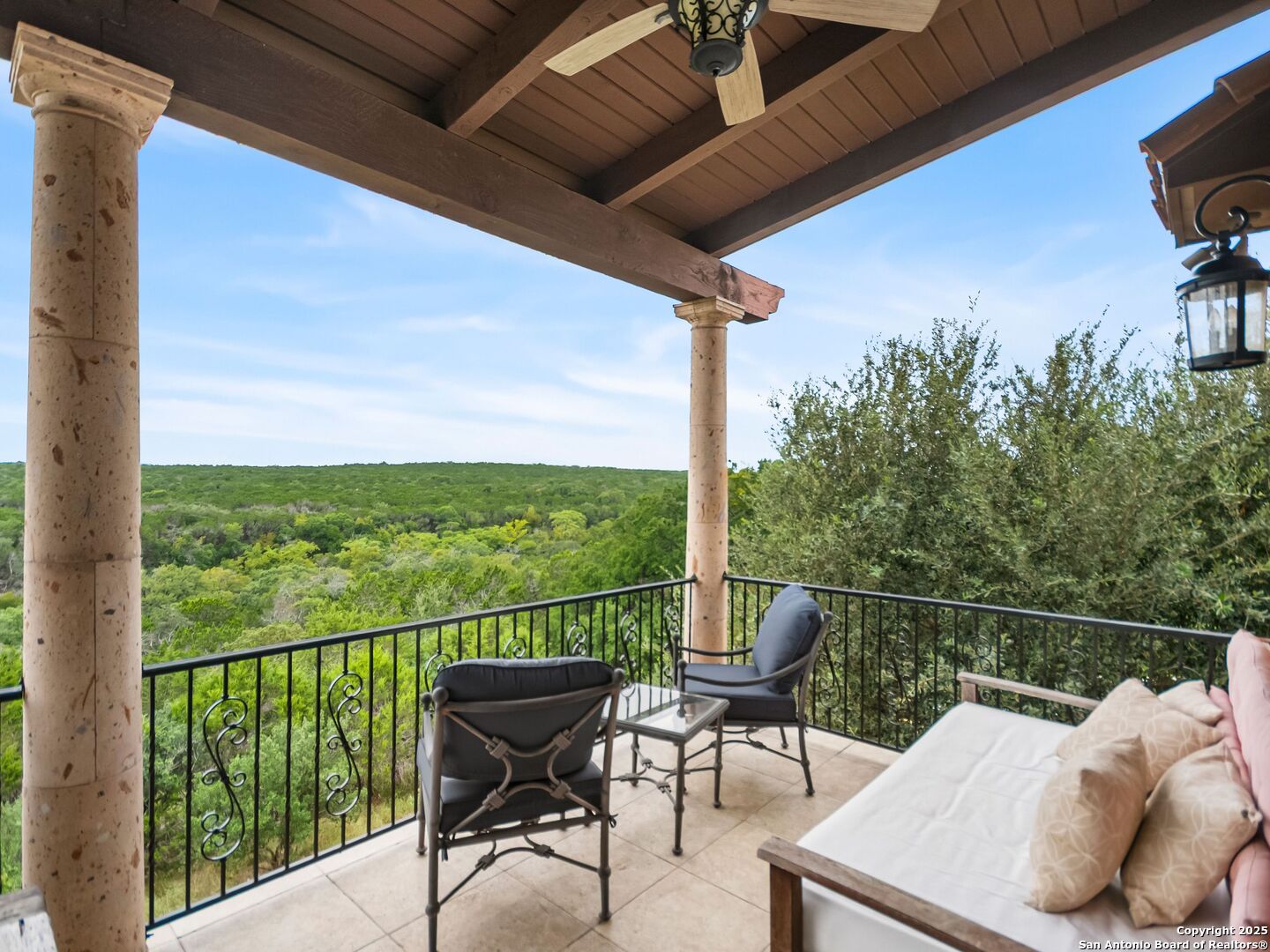 103 Castle Rock Boerne, TX 78006 - Photo 78 of 99 a view of a chair and table in the balcony