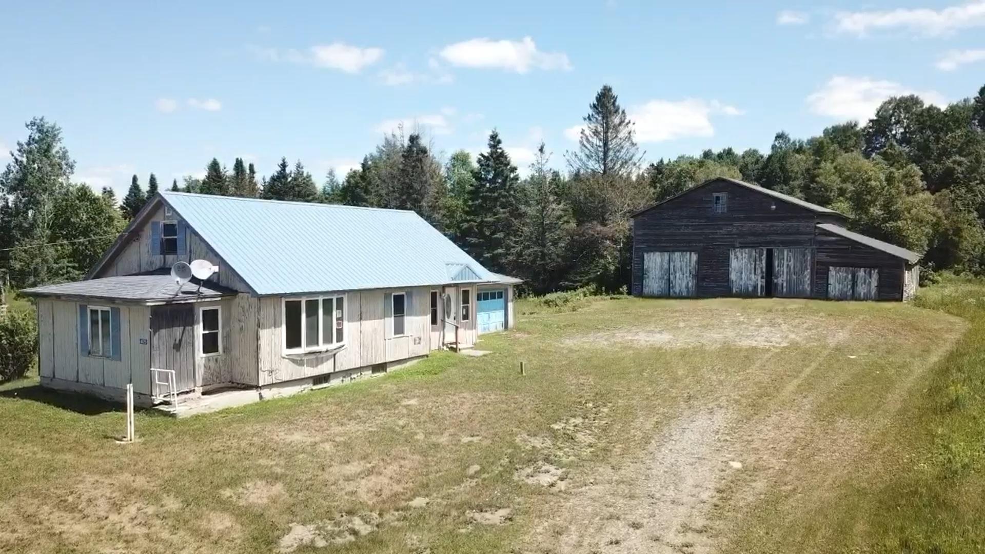 605 Van Buren Road Limestone, ME 04750 - Photo 1 of 16 605 VB Rd Front
