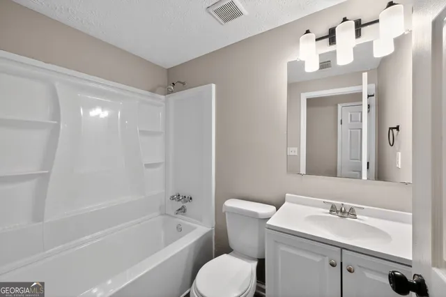 a view of small space with racks on the wall