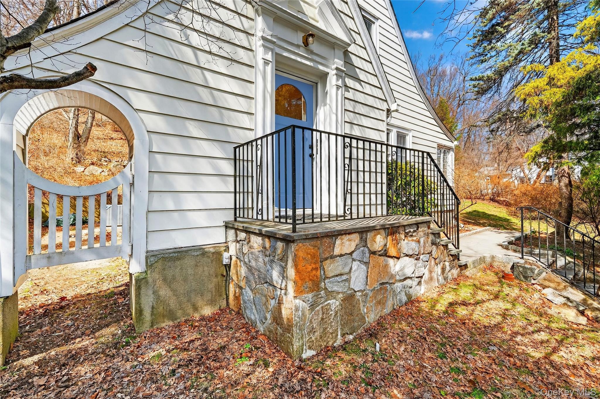 410 Decatur Avenue Peekskill, NY 10566 - Photo 1 of 47 a front view of a house with a garden