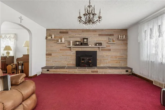 a view of livingroom with furniture and window