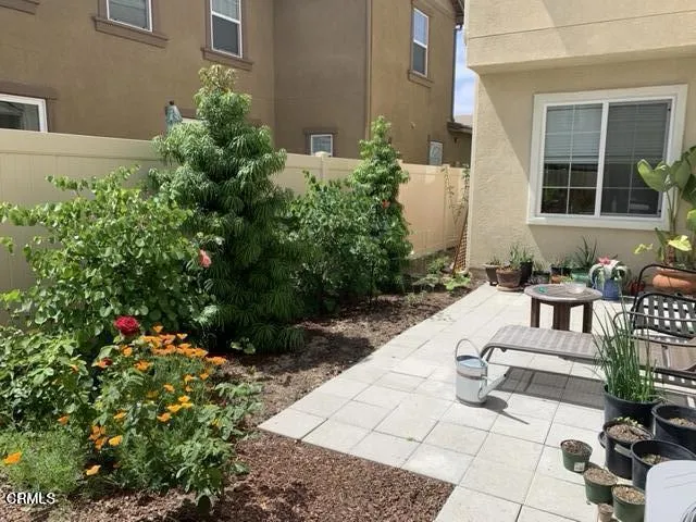 a view of garden with patio