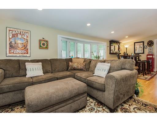 52 Harland Road Waltham, MA 02453 - Photo 12 of 37 a living room with furniture and a large window