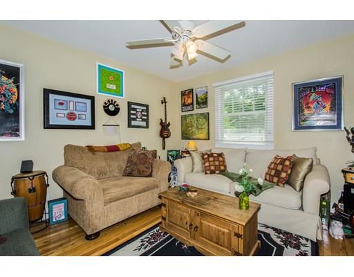 52 Harland Road Waltham, MA 02453 - Photo 18 of 37 a living room with furniture and a large window
