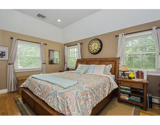 52 Harland Road Waltham, MA 02453 - Photo 21 of 37 a bedroom with a bed and a window