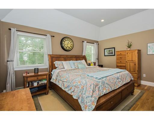52 Harland Road Waltham, MA 02453 - Photo 22 of 37 a bedroom with a bed and a window