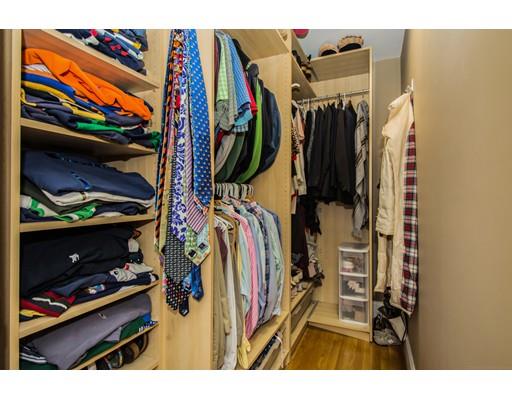 52 Harland Road Waltham, MA 02453 - Photo 25 of 37 a view of walk in closet with clothes and shoes
