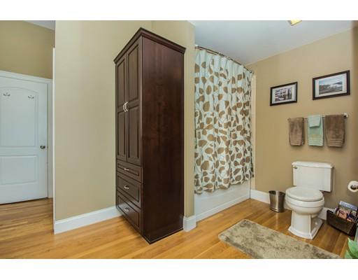 52 Harland Road Waltham, MA 02453 - Photo 26 of 37 a view of bathroom with a toilet and a shower curtain