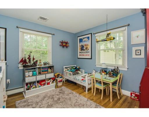 52 Harland Road Waltham, MA 02453 - Photo 30 of 37 a living room with furniture and a large window