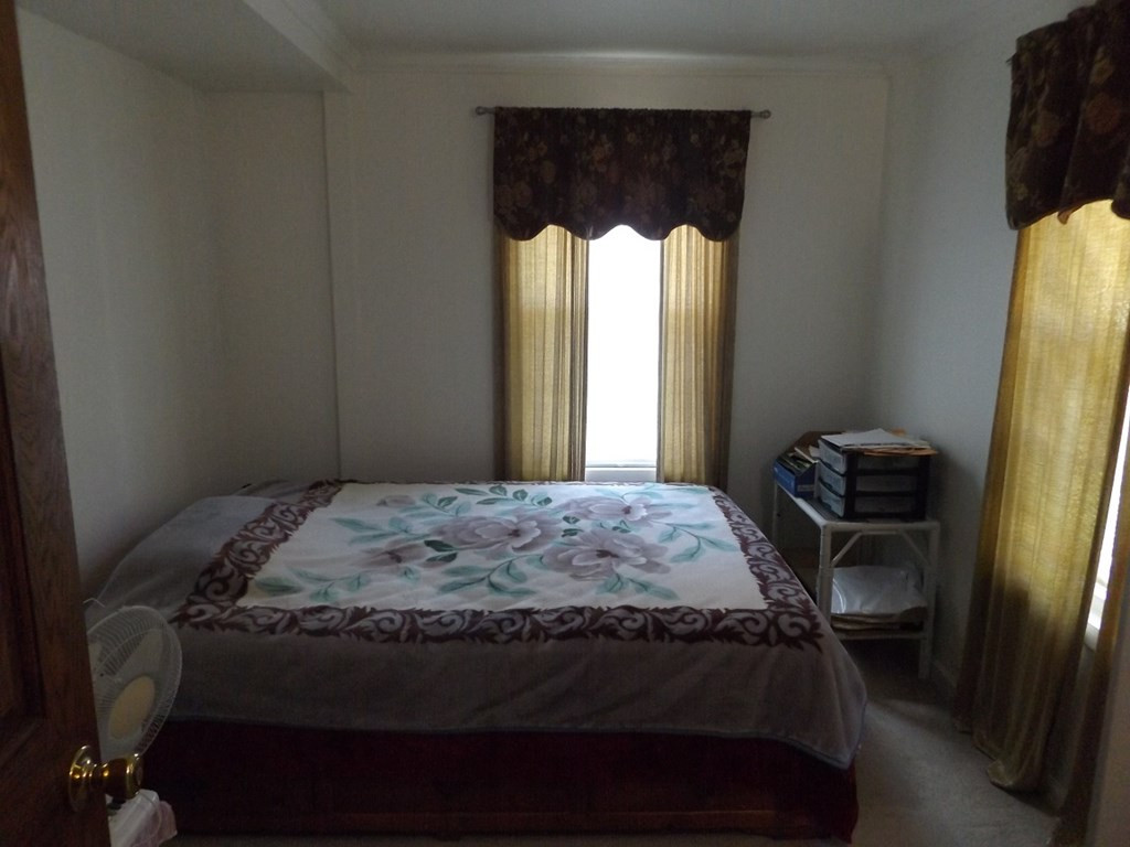 707 Ruby Street Jackson, SC 29831 - Photo 23 of 35 a bedroom with a bed and window