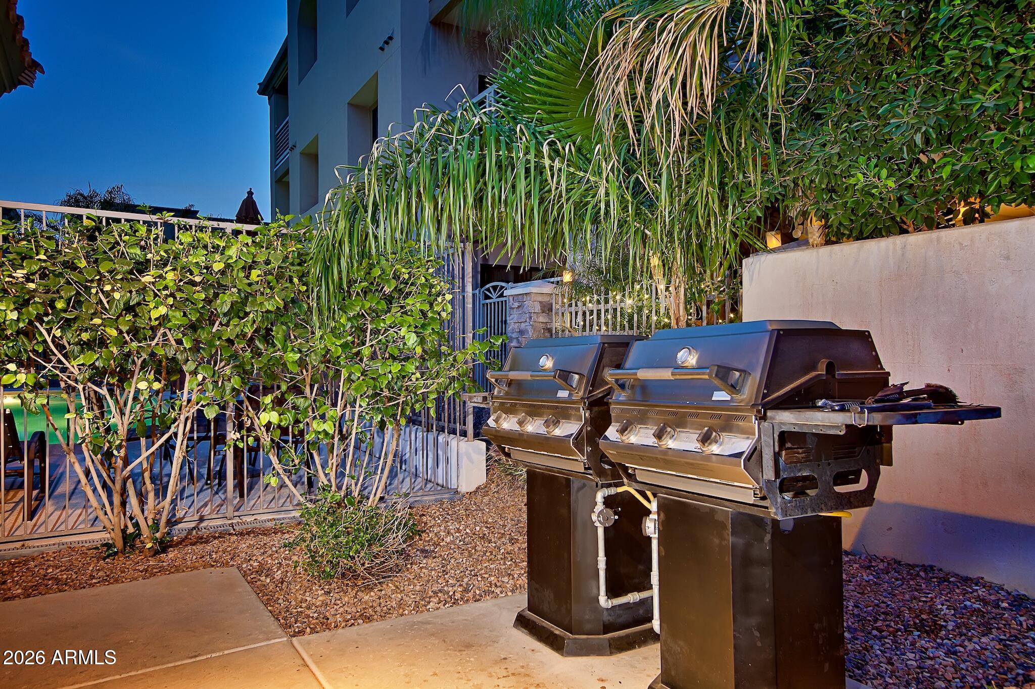 7609 East Indian Bend Road, Unit 3002 Scottsdale, AZ 85250 - Photo 16 of 19 a view of a backyard with plants