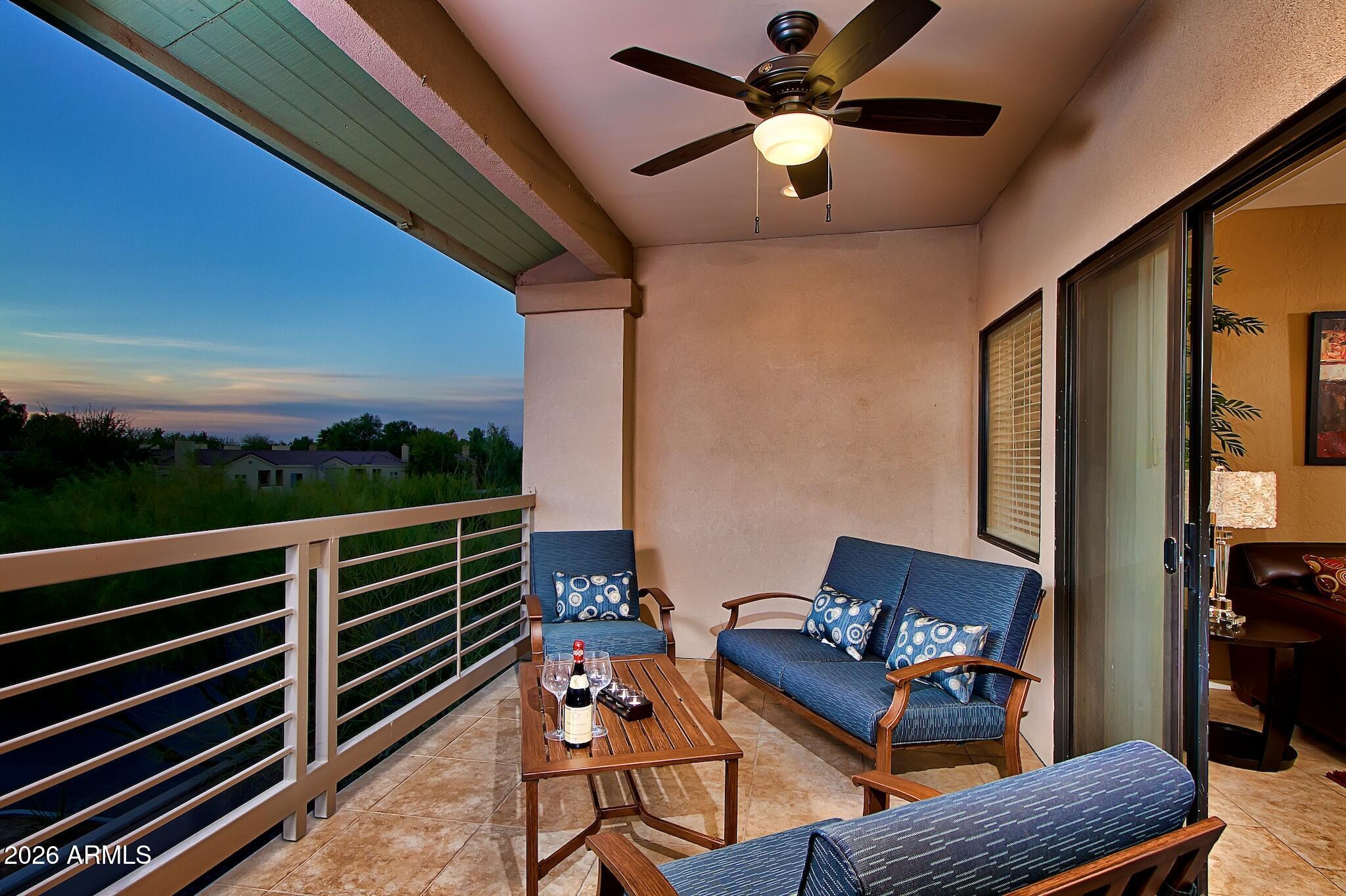 7609 East Indian Bend Road, Unit 3002 Scottsdale, AZ 85250 - Photo 9 of 19 a outdoor living space with furniture