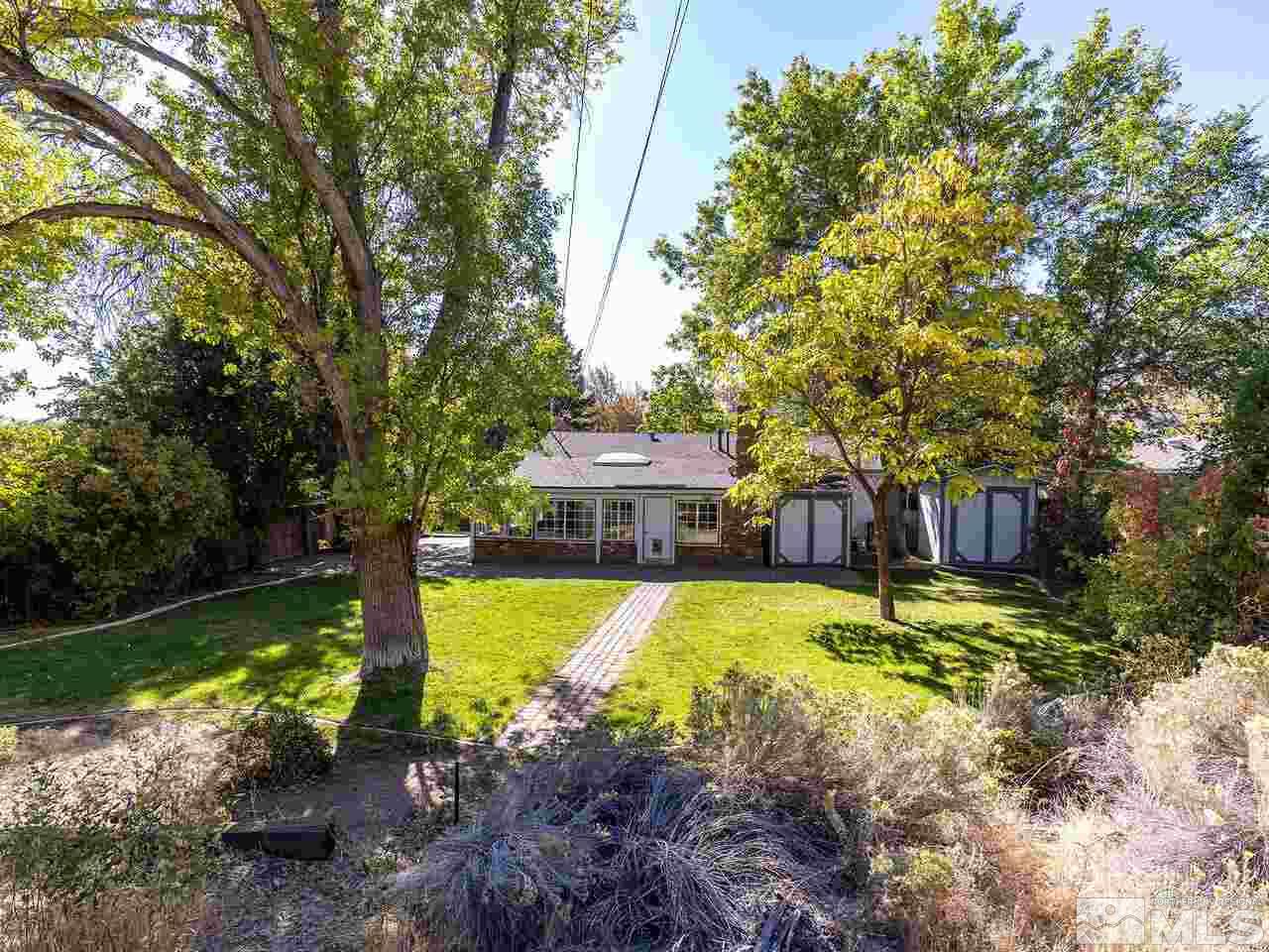 1901 Elmcrest Drive Reno, NV 89503 - Photo 26 of 31 a view of a house with swimming pool and yard
