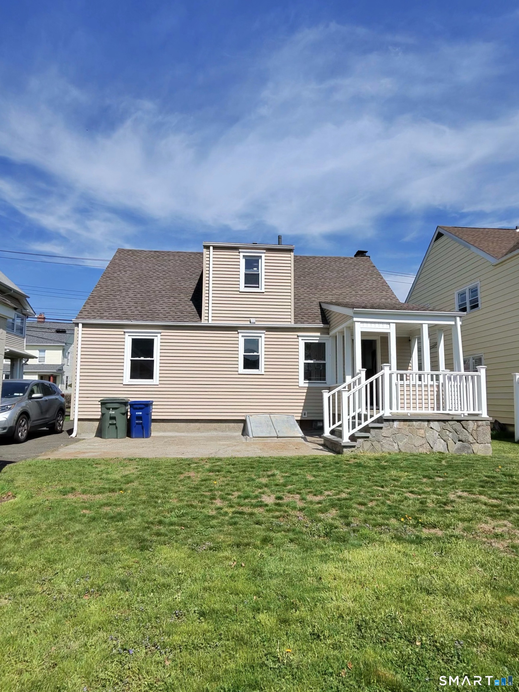 457 Summit Street Bridgeport, CT 06606 - Photo 2 of 9 a front view of a house with a yard