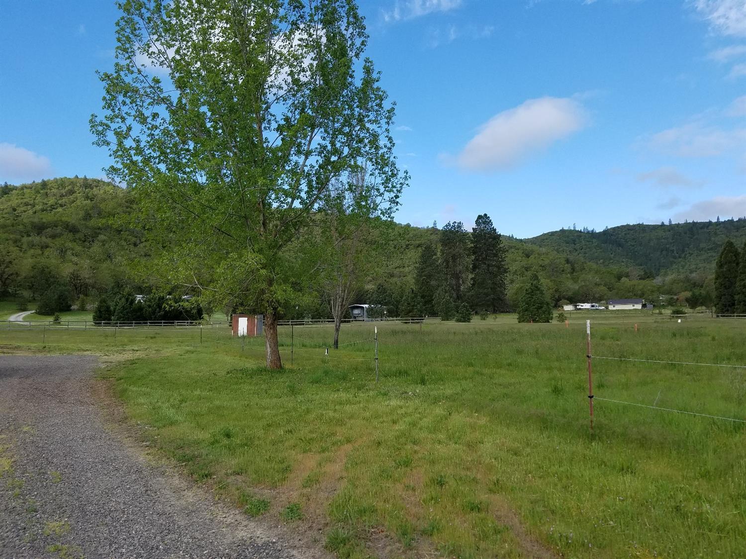 0 Colonial Way Central Point, OR 97502 - Photo 7 of 8 a view of grassy field with trees