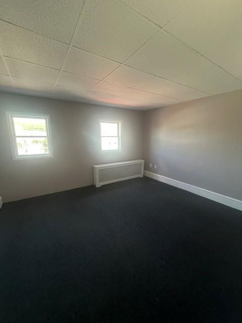 126 East High Street Coaldale, PA 18218 - Photo 13 of 15 A well-lit, open interior space with fresh paint and newly installed carpeting.