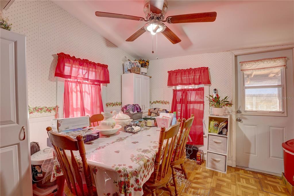 13172 Clay Avenue Largo, FL 33773 - Photo 8 of 30 a view of a dining room with furniture window and outside view