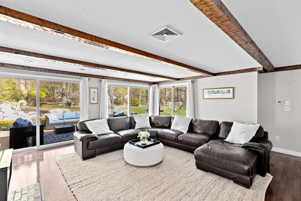 47 Deborah Road Hanover, MA 02339 - Photo 5 of 22 a living room with furniture and a large window