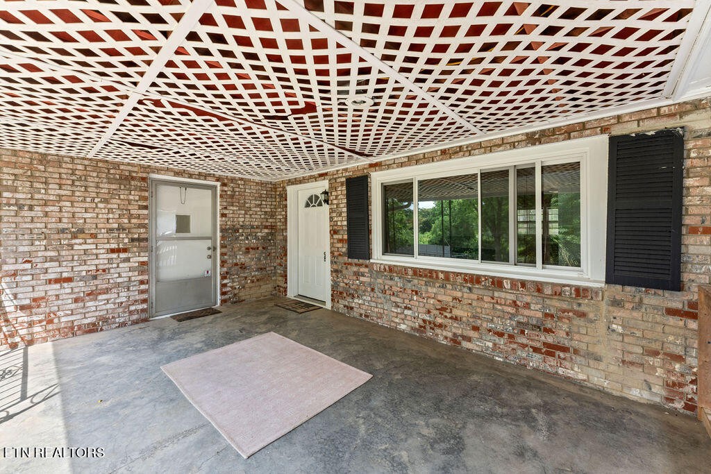 114 Tucker Road Oak Ridge, TN 37830 - Photo 15 of 22 front view of a house with a large window