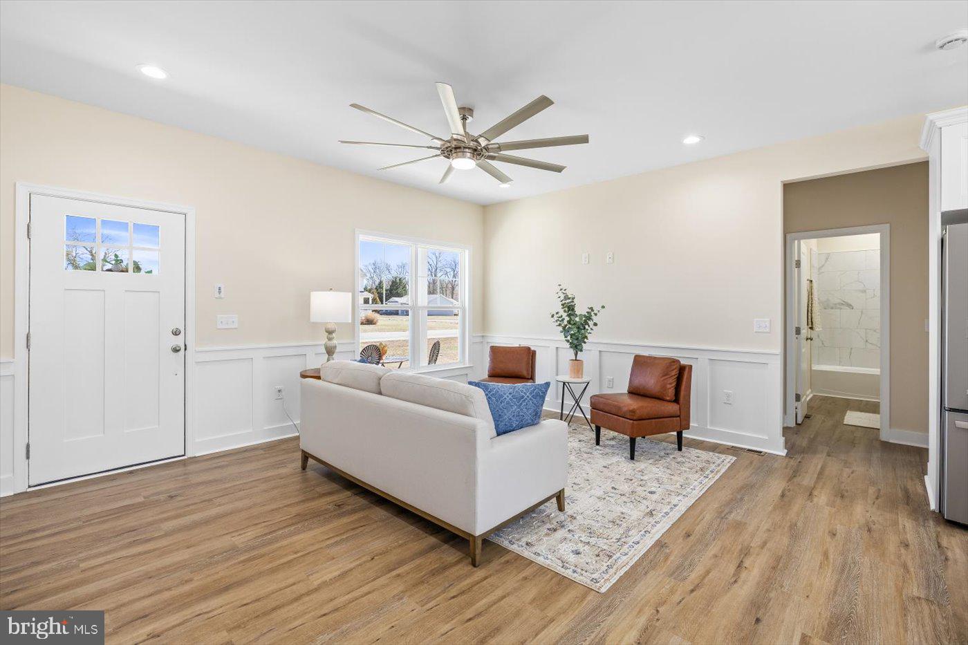 1419 South Glebe Road Montross, VA 22520 - Photo 26 of 76 a living room with furniture and a wooden floor