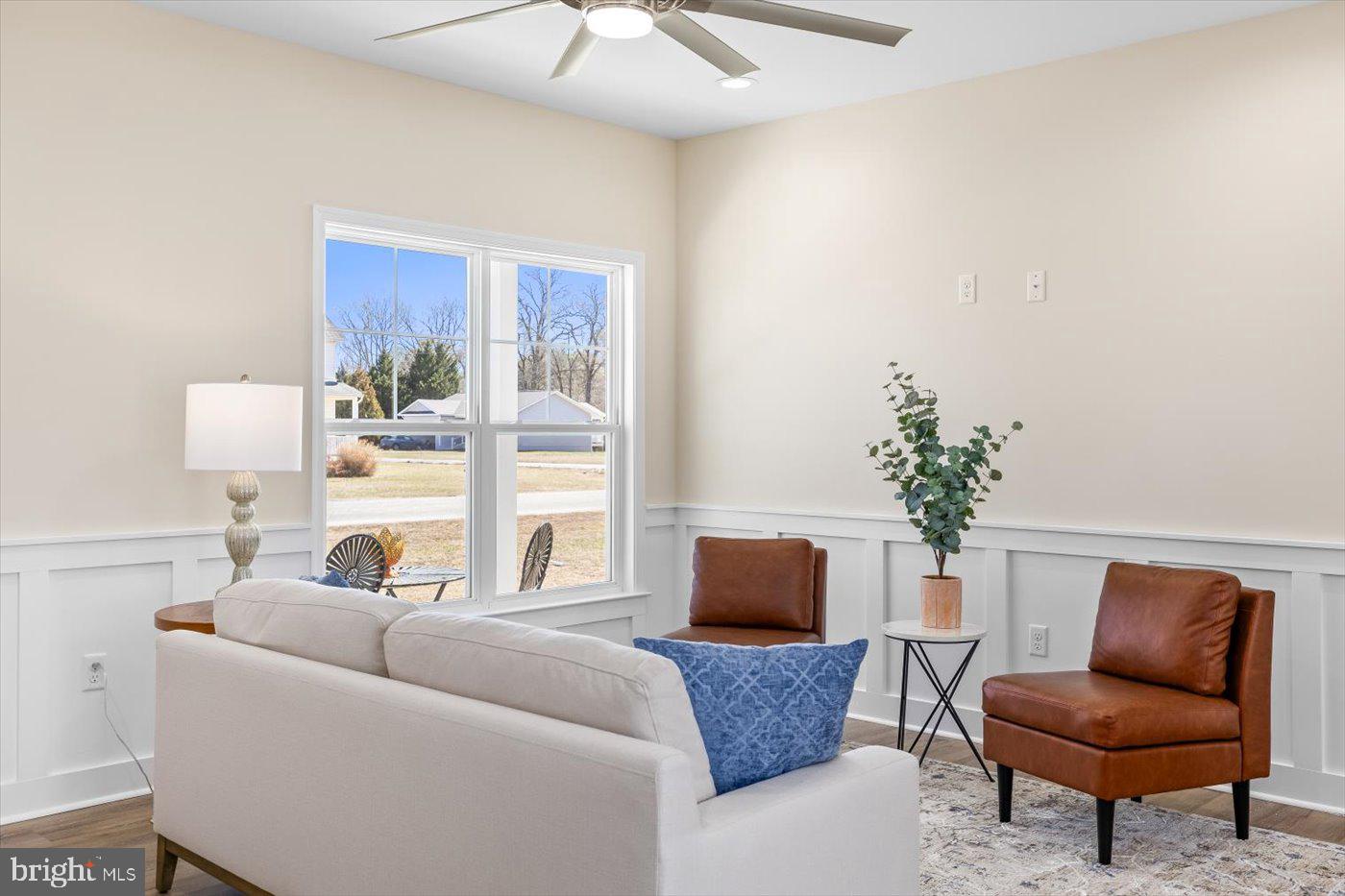 1419 South Glebe Road Montross, VA 22520 - Photo 27 of 76 a living room with furniture and a potted plant