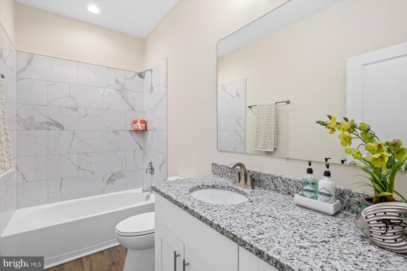1419 South Glebe Road Montross, VA 22520 - Photo 47 of 76 a bathroom with a granite countertop sink and a mirror